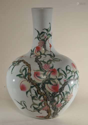 Porcelain vase. China. 20th century. Possibly Republic Period. Bottle form. Famille Rose 