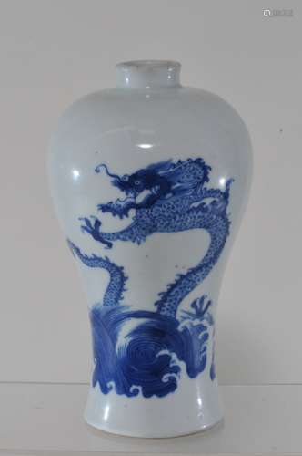 Porcelain vase. China. 19th century. Meiping form. Underglaze blue decoration of a water dragon and a carp rising above the waves. 7