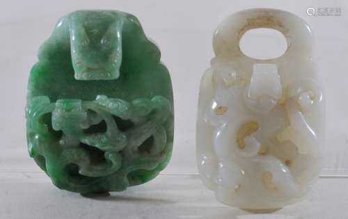Two Jade garment hooks. China. 19th century. Chih Lung decoration. One white and one green. Each about 2-1/4