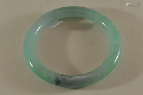 Jadeite bracelet. China. 20th century. Highly translucent blue-green colour. 3-1/4
