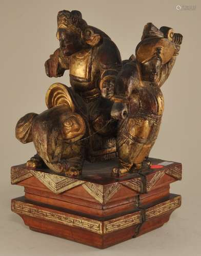 Wood carving. China. 19th century. Kuan Yu on the back of an elephant with an attendant. 11