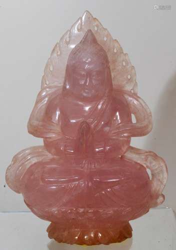 Rose Quartz carving. China. 20th century. Seated figure of The Buddha with a flame halo at the back. 6