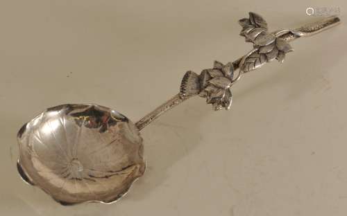 Silver spoon. China. 19th to early 20th century. Worked as a lotus plant. 7