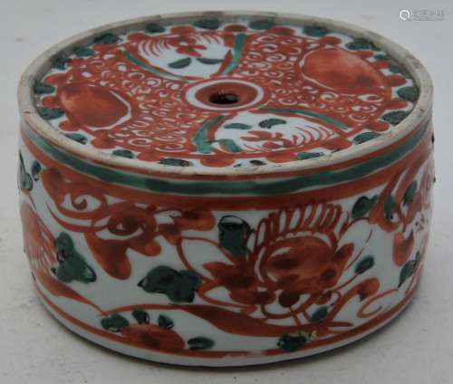 Porcelain water dropper. Japan. 19th/20th century. Ko Aka e swatow style decoration of floral elements in red and green. 5-1/4