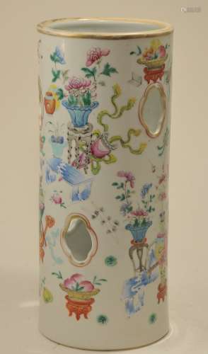 Porcelain hat stand. China. 19th century. Cylindrical form with quatrefoil piercings. Famille Rose decoration of 