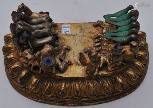 Base for a Tantric Buddhist Divinity. Gilt bronze with red, blue and green pigments. 9