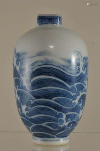 Porcelain vase. China. 19th century. Oviform with a squared mouth. Underglaze blue decoration of waves. 3-1/2