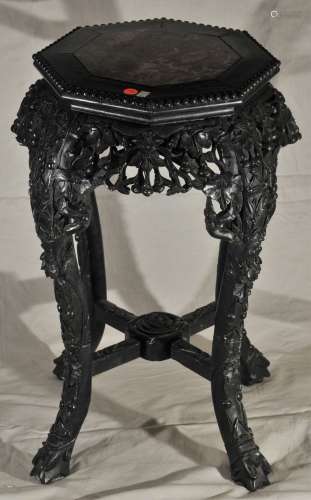 Rosewood Tabouret. China. 19th century. Octagonal top. Surfaces carved with gourd plants. Top inset with red marble plaque. 16