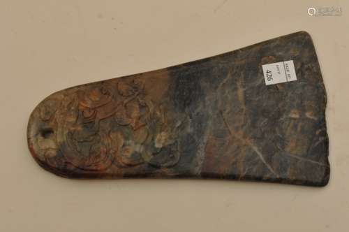 Hardstone axe. China. 19th century. Surface  carved with a chih lung and an archaic inscription. 7-1/4