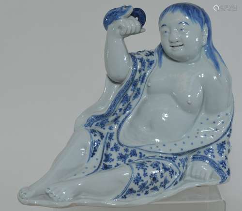 Porcelain figure. China. Early 20th century. Figure of Liu Hai with his frog. Underglaze blue decoration. Signed, 9-1/2