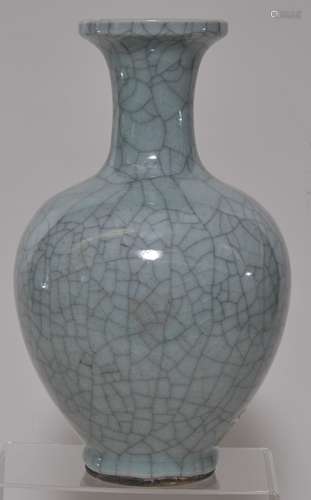 Porcelain vase. China. Early 20th century. Kuan style glaze of crackled blue green celadon. 11-1/2