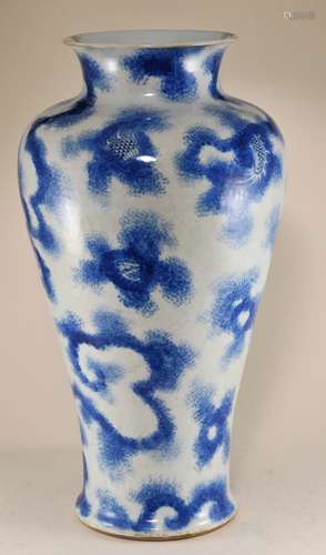 Porcelain vase. China. Early 20th century. Baluster form. Underglaze blue decoration of dragons and clouds. 16-3/4