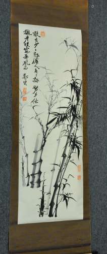 Hanging scroll. China. 20th century. Ink on paper. Scene of bamboo and a poem. Signed and with five seals. 50