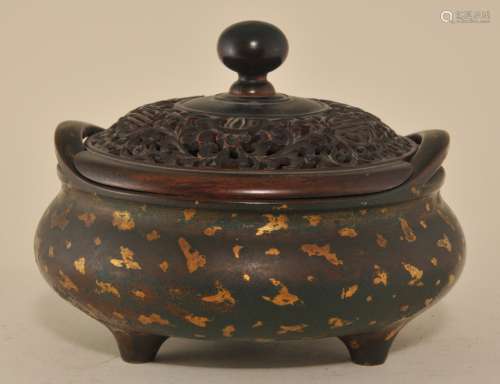 Bronze  gold splashed bombe form censer. China. Ming Period (1368-1644). Huan Te mark on base. Fine quality 19th century carved wood cover.  Censer- 4-3/4