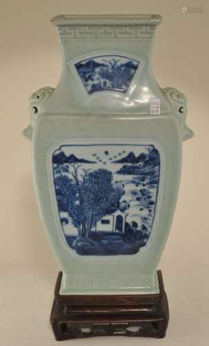 19th century Chinese Celadon ground porcelain vase with relief bamboo carved sides. Blue and white landscape panels. Elephant head handles. 14-1/2
