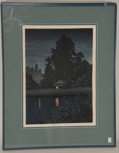 Woodblock print. Japan. Signed Hasui and dated 1931. Scene of a houses at dusk by the river. 15