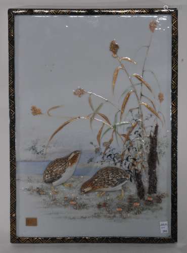Porcelain plaque. Japan. Meiji Period (1868-1912). Relief decoration of quails and millet plants. Gold seal on the lower left side. Small chip to one corner. 15