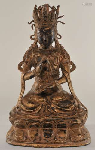 Bronze Buddha. China. 19th century. Later gilt surface. 12