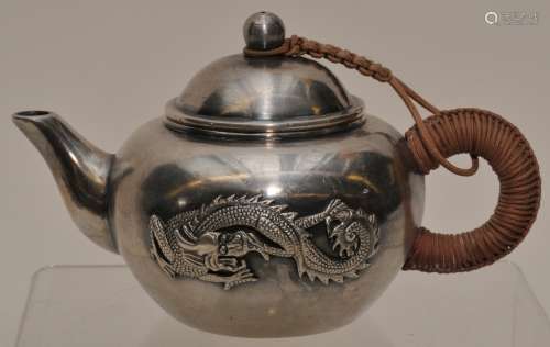 Silver tea pot. China. 20th century. Dragon and phoenix decoration.  Marked 99.9%. Signed . 8.7 ozt.  5
