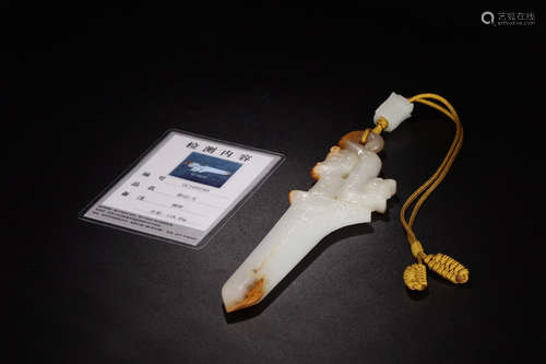 A HETIAN JADE SHAPED SWORD ORNAMENT