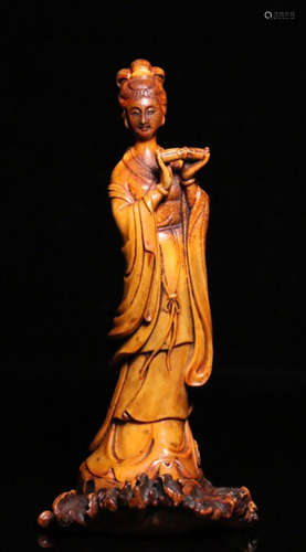 A LUJIAO CARVED FIGURE SHAPED PENDANT