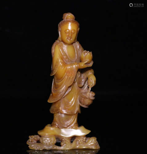 A SOAPSTONE CARVED GUANYIN FIGURE