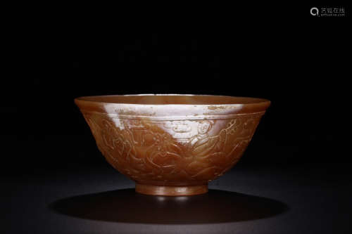 A RED AGATE CARVED GIFURE PATTERN BOWL