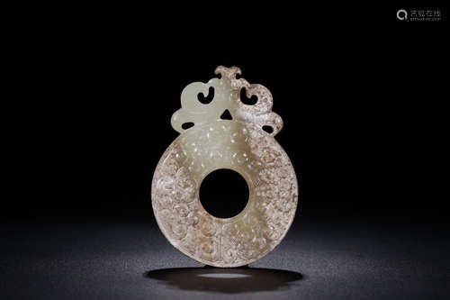 A HETIAN JADE CIRCULAR ORNAMENT