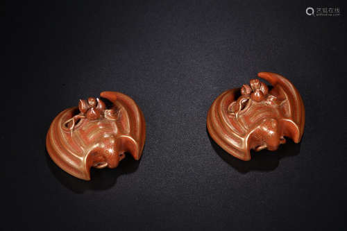 A PAIR OF BROWN BAT PORCELAIN ORNAMENTS