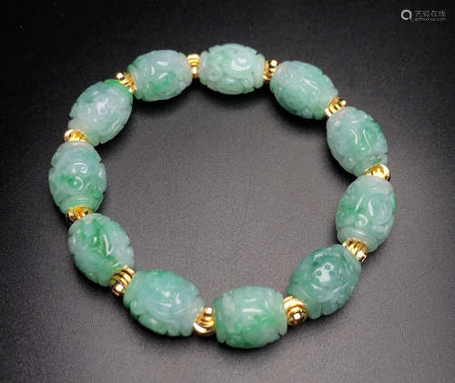 A WAXY JADEITE BRACELET SHAPED LOTUS