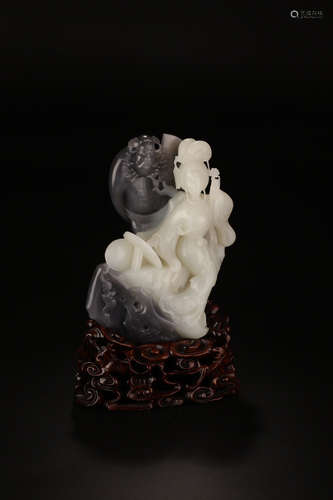 A HETIAN JADE ORNAMENT WITH STORY-TELLING SHAPED