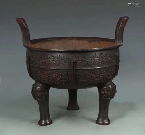 A BROZNE CASTE WRAPPED PATTERN TRIPOD CENSER