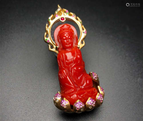 AN AKA RED CORAL SHAPED BUDDHA WITH 18K GOLD PENDANT