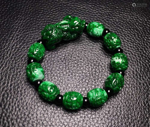 A JADEITE BRACELET OF PIXIU