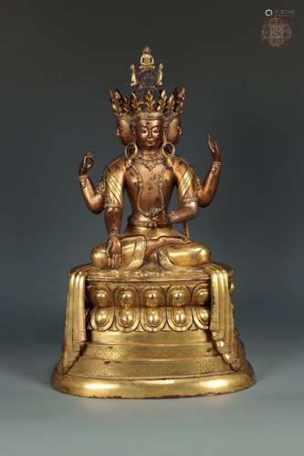 A GILT-BRONZE FIGURE OF USHNISHAVJAYA