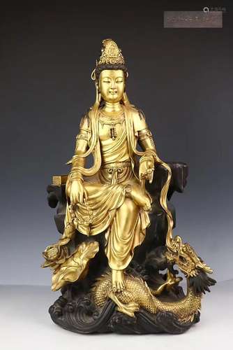 A GILT-BRONZE FIGURE OF GUANYIN