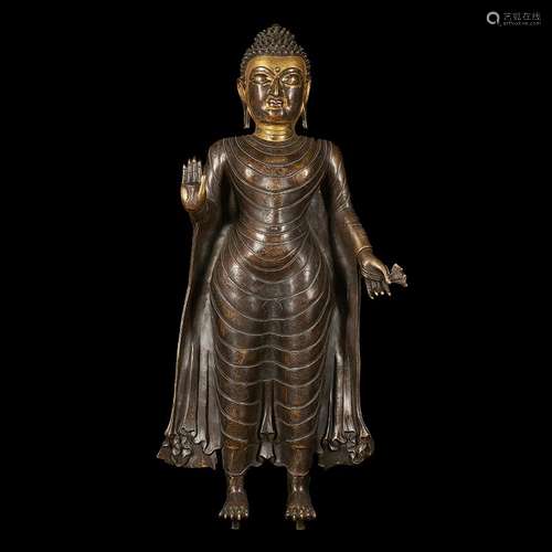 A GILT-BRONZE FIGURE OF AMITABHA