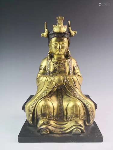 A GILT-BRONZE FIGURE OF GUANYIN