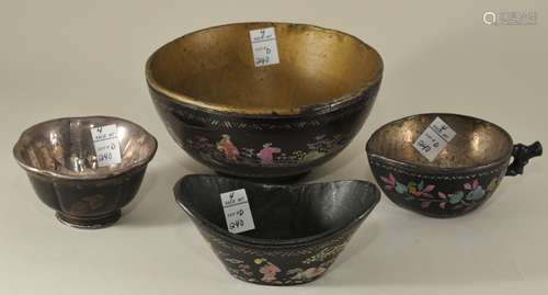 4 lacquered cups. China. 18th century. 3 of Lac Burgante. One ingot shaped, one peach shaped, a bowl with figures together with a silver liner. Largest- 4-1/2