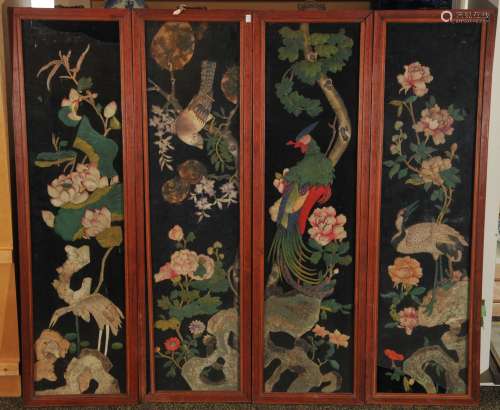 Set of four decoupage panels. China. 19th to early 20th century. Decoration of birds and flowers. Rosewood frames. Glazed. Stains and toning. 40-1/2