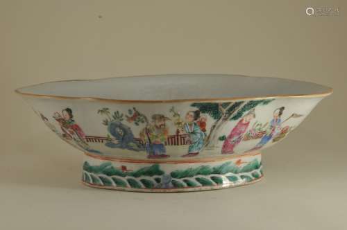 Porcelain serving bowl. China. 19th  century. Oval foliated shape with Famille Rose decoration of The Immortals. 11