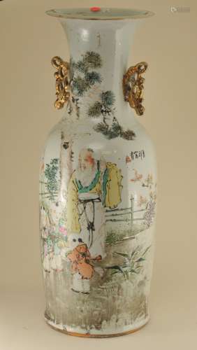 Porcelain vase. China. Early 20th century. Famille Rose decoration of Shao Lao and children. Baluster form, gilt rockery shaped handles. Age line at the mouth. 24