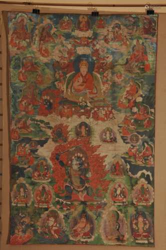 Buddhist Icon. Tibet. 17th century. Ink and mineral pigments on heavy cloth. Thangkha of Karmapa Lama with lineage figures and tantric divinities. 45