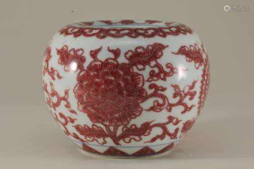 Porcelain water coupe. China. 19th century. Globular form. Underglaze red and blue decoration of stylized flowers with a ju-i border K'ang Hsi mark. 3-1/4