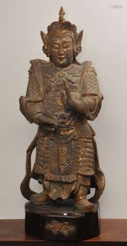 Large Chinese carved and gilt wood figure of a standing warrior. 37