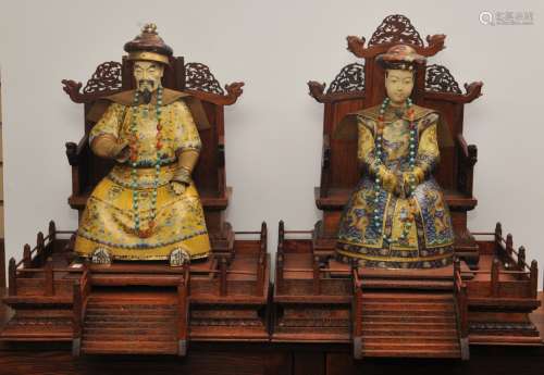 Pair of Emperor and Empress figures. China. 20th century. Cloisonne bodies. Rosewood thrones inlaid with silver. 20