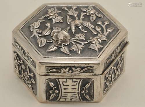 Hexagonal silver box. China. 19th century. Repousse decoration of birds and flowers. Signed.   2-1/4