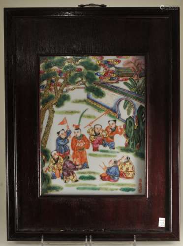 Porcelain plaque. China. 20th century. Famille Rose enameled decoration of children playing. 11-1/2