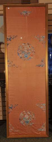 Textile panel. China. 19th century. Orange silk with embroidery of baskets of flowers and floral sprigs. 67