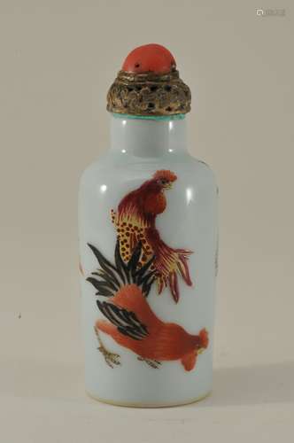 Porcelain snuff bottle. Kuang Hsu mark (1875-1908) and probably of the period. Cylindrical form. Decoration of roosters. Coral stopper. 2-1/2